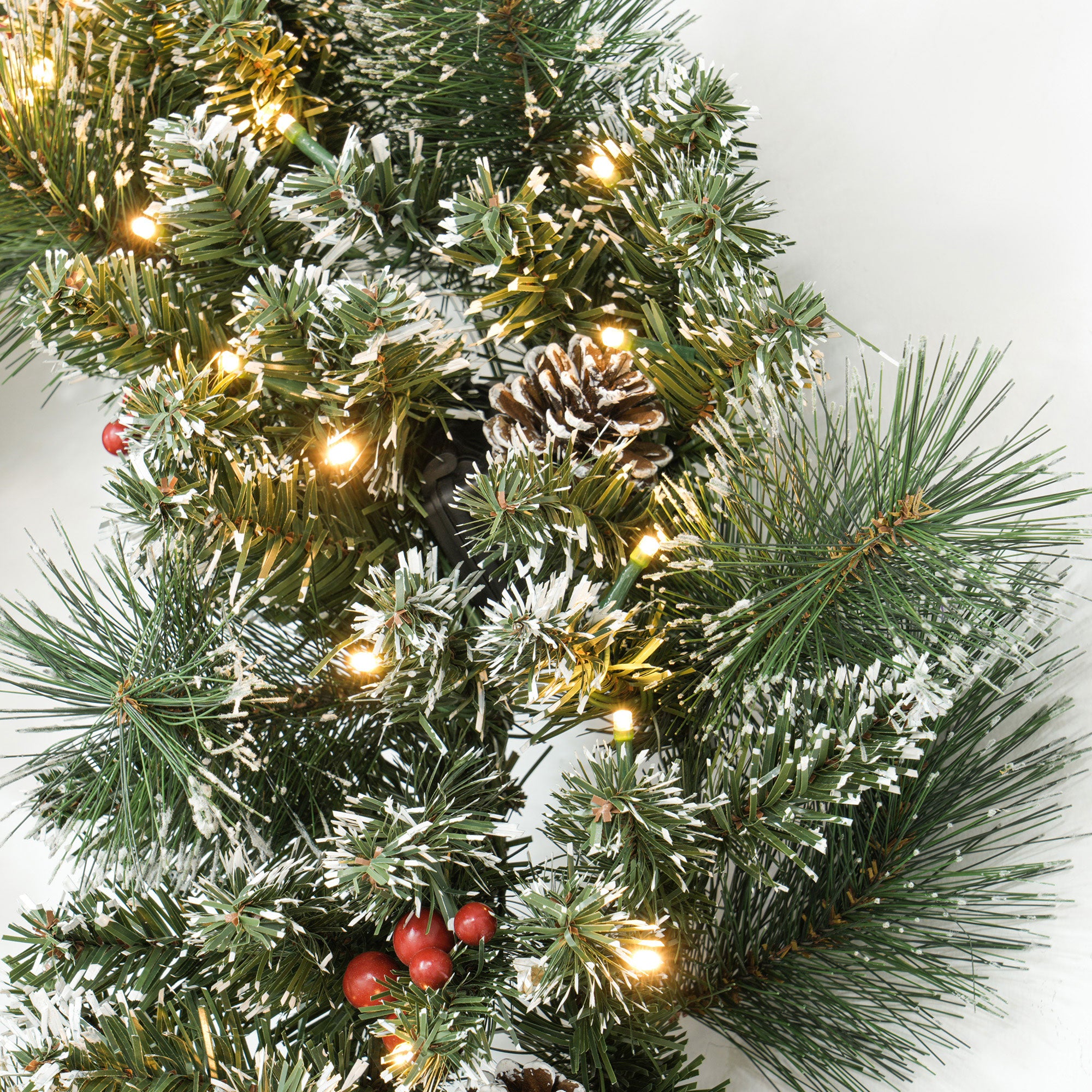 Couronne de Noël porte artificielle 60 CM décoration de Noël lumineuse avec pommes de pin et grappes de baies, lumières LED et minuterie, pour porte, fenêtre ou cheminée, vert