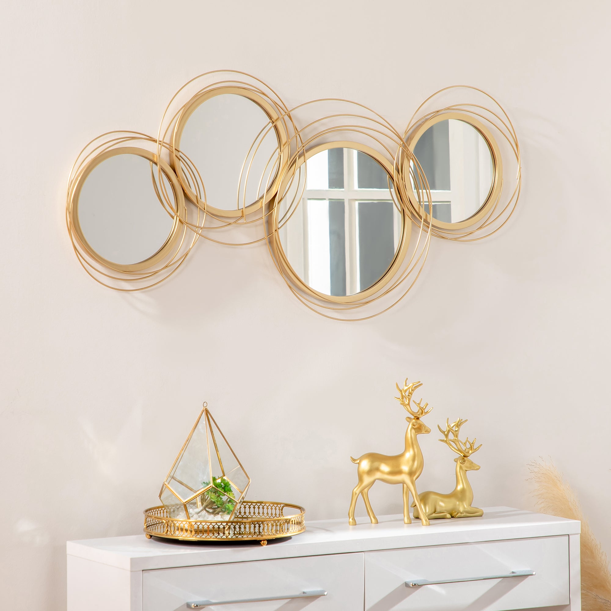 Ensemble de 4 miroirs ronds en métal dorés - 107 x 56 cm